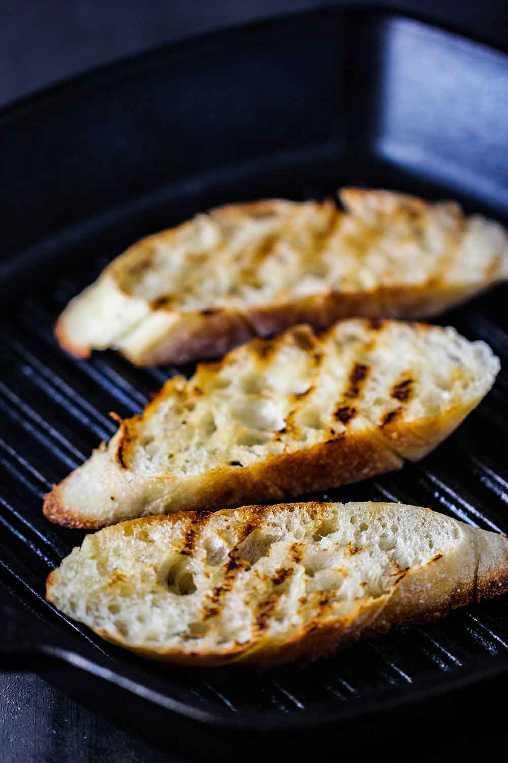 Grill baguette slices for soaking up the Cajun juices.