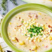 A green bowl of farm fresh corn chowder.