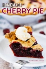 A single slice of cherry pie on a white dessert plate with a scoop of vanilla ice cream on top.