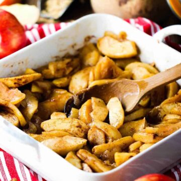 Baked cinnamon apples in a white dish
