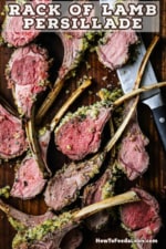 An overhead view of roasted lamb chops with a bread crumb topping baked into the sides of each chop.