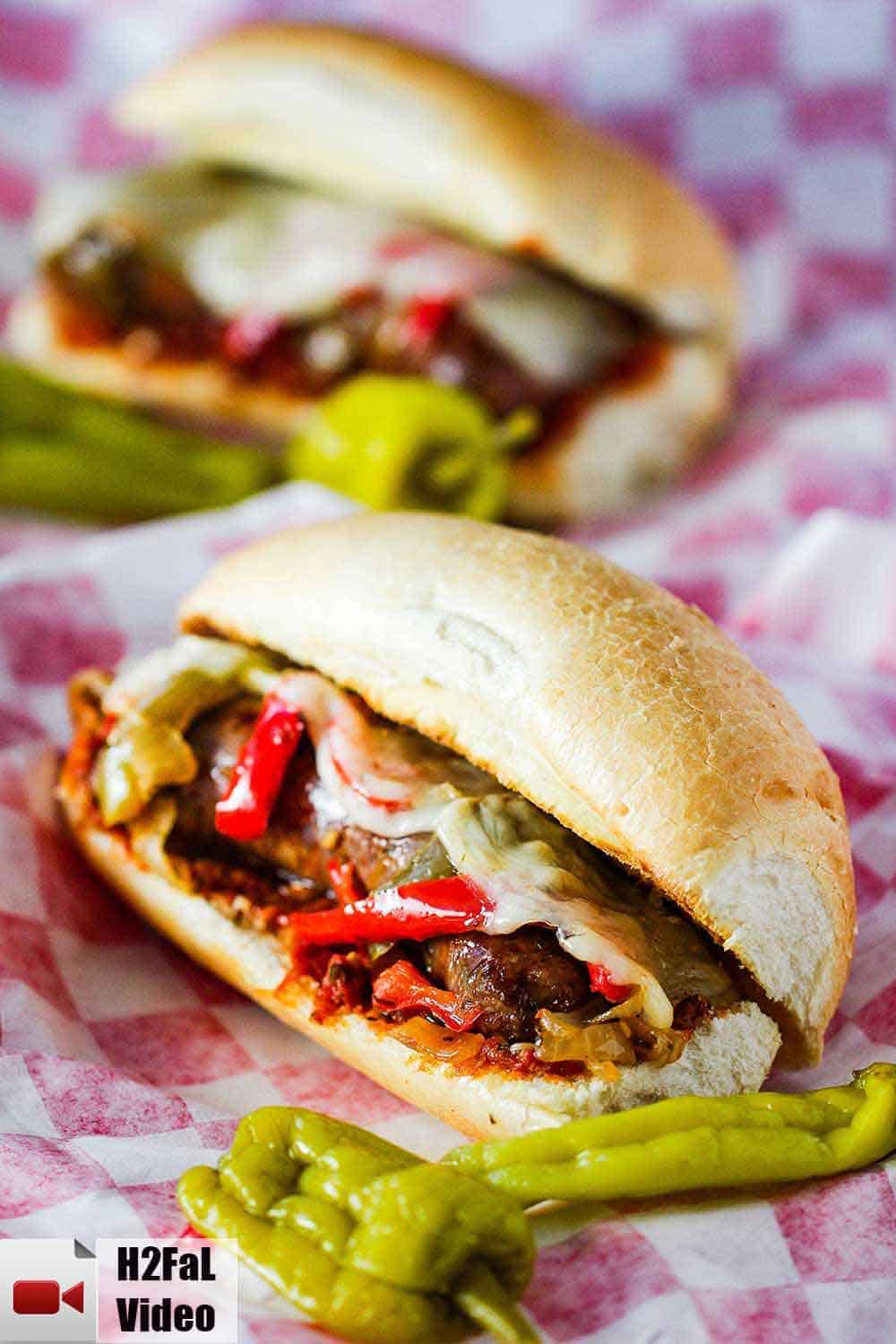 Sausage and Peppers Hero a checkered napkin. 
