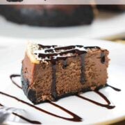 A slice of Instant Pot Chocolate Marble Cheesecake on a white plate