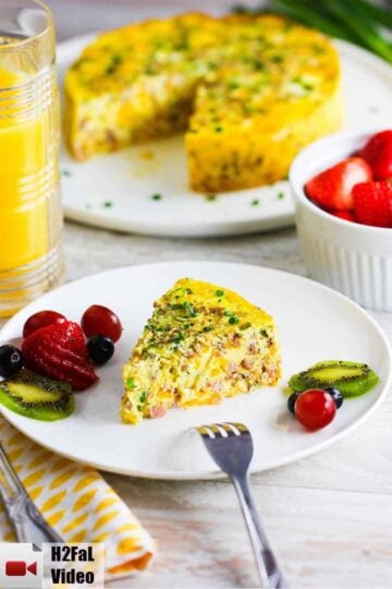 A slice of Instant Pot Cheesy Frittata on a white plate