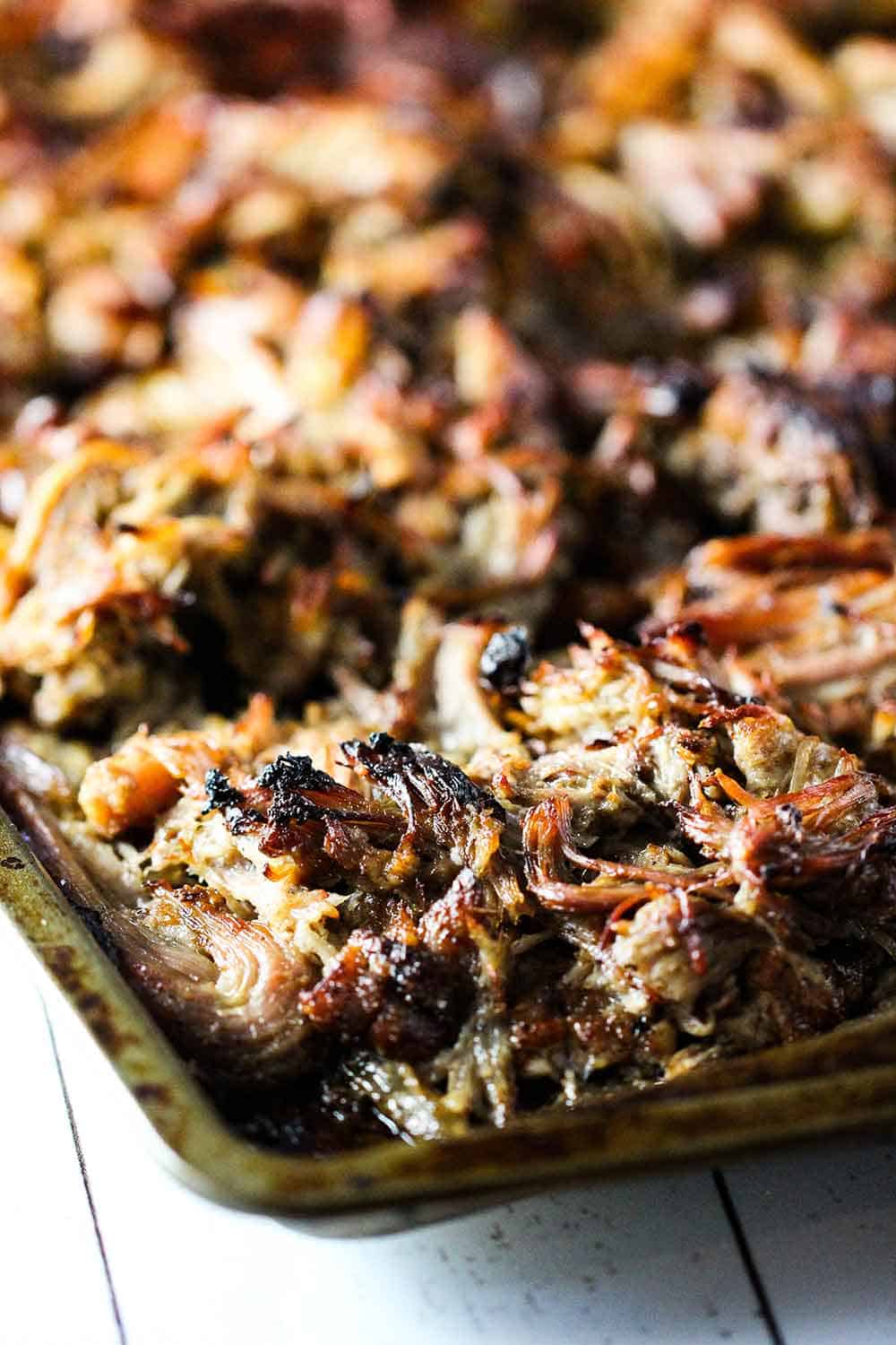 Place the pork on a large baking sheet and crisp under a broiler for about 8 minutes.