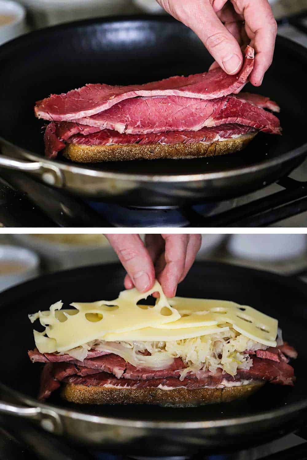A person layer corned beef on top of slice of rye bread in a non-stick skillet and then that person layering on sauerkraut and Swiss cheese slices.