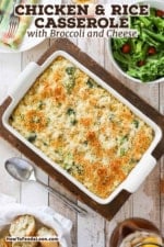 An overhead view of a 9 by 13 white baking dish filled with a chicken and rice casserole topped with toasted breadcrumbs and flanked with a bowl of a green leaf salad and a basked of bread pieces.