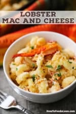 A small white bowl filled with a serving of homemade lobster mac and cheese with a fork nearby.